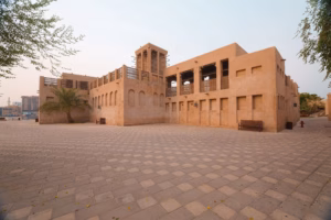 Sand-coloured courtyard and wind towers in Al Fahidi Historical Neighbourhood, Bur Dubai
