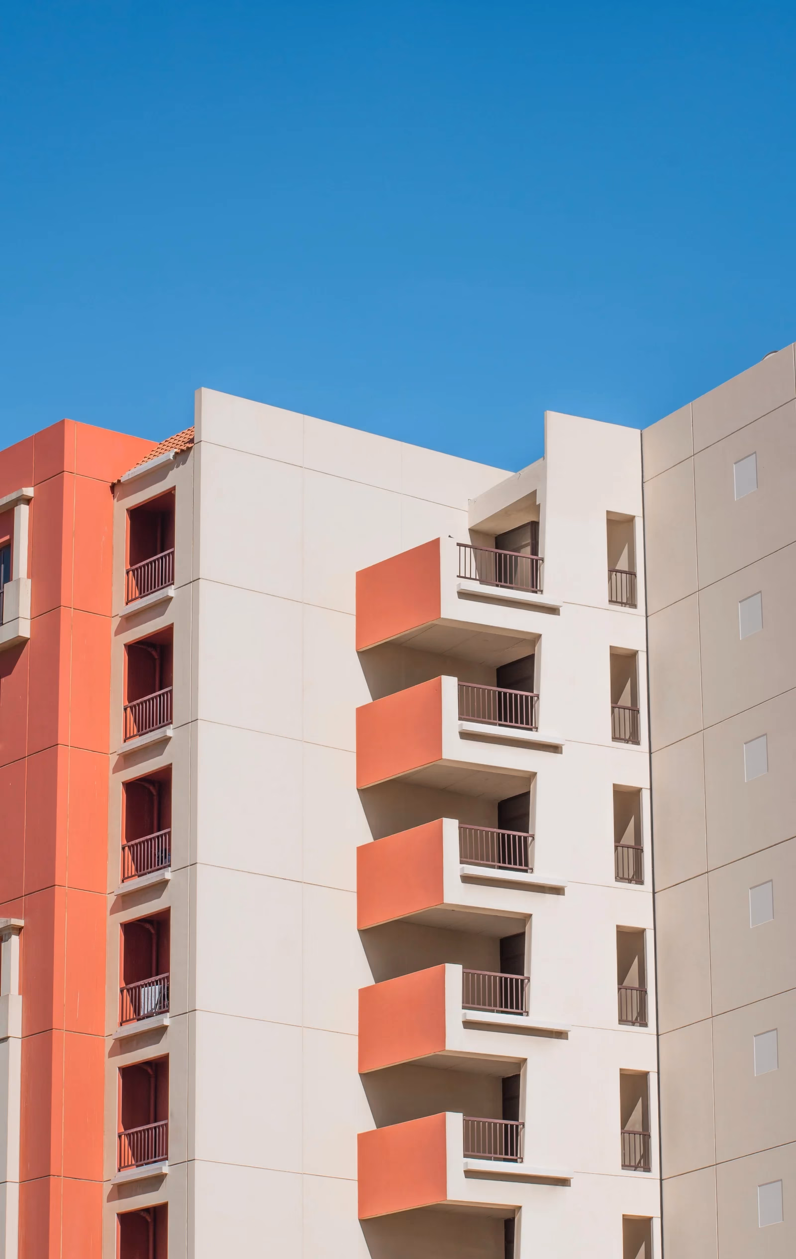 Apartment building with balconies in Dubai, where Dubai shared accommodation rules now set five square metres of bedroom space per person