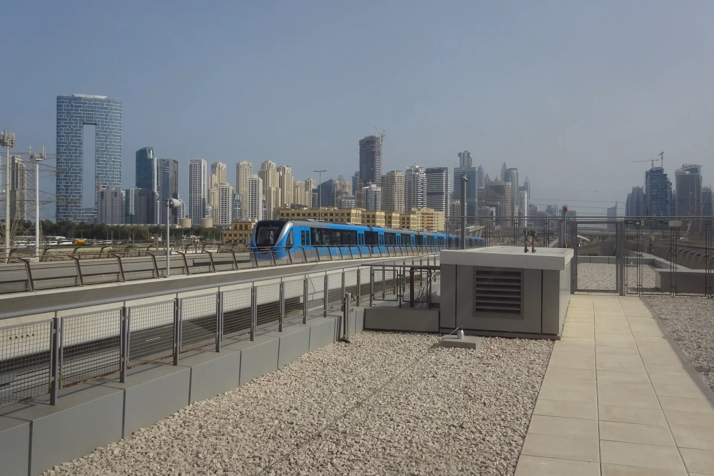 Red Line train beside the elevated platform at National Paints Metro Station, then called Jabal Ali, the start of a proposed Dubai driverless pods route to Bluewaters