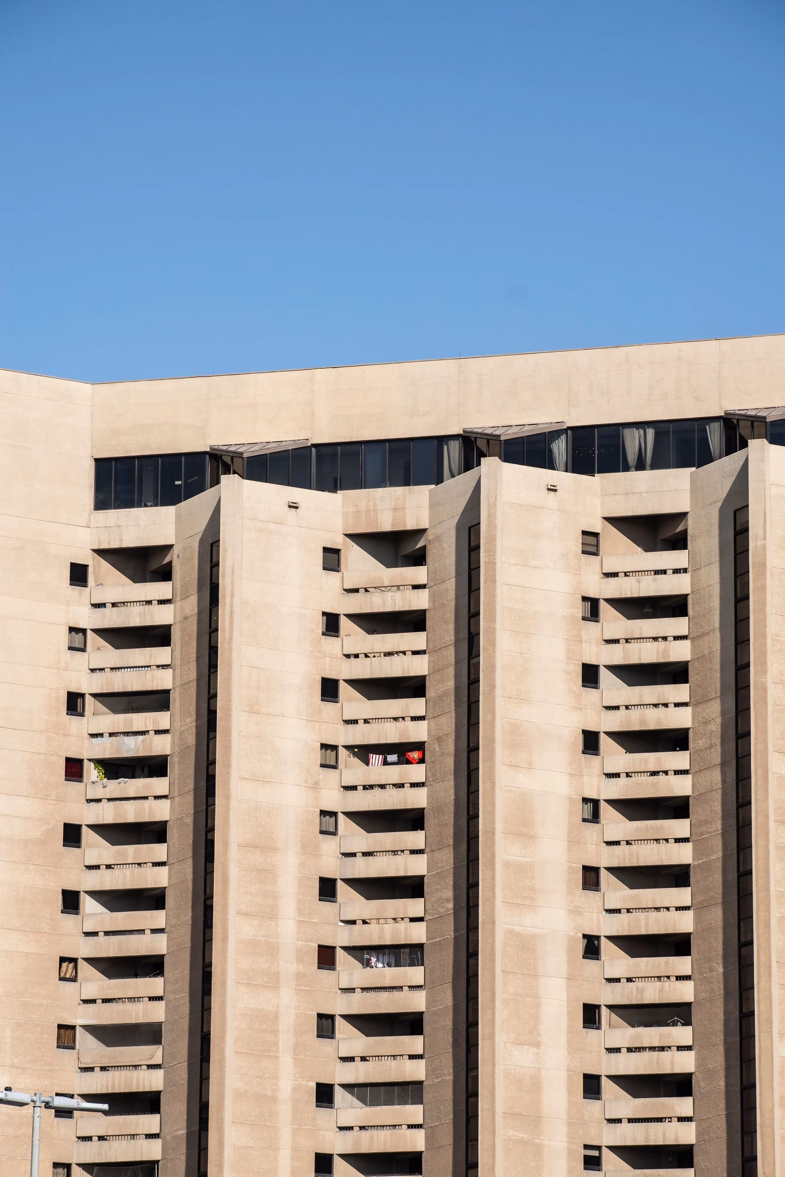 Residential block of flats in Dubai, typical of buildings where tenants share apartments and must follow new space and bathroom rules