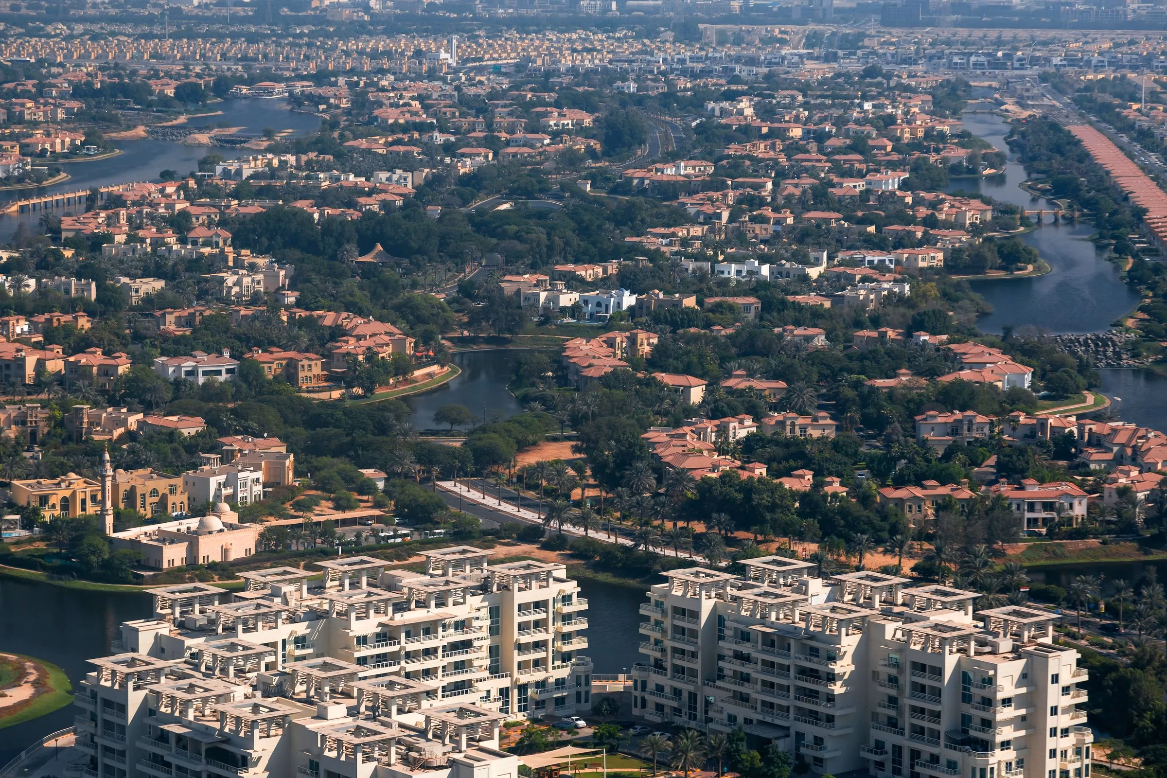 Aerial view of Jumeirah Islands villas in Dubai, where school planning follows community demand