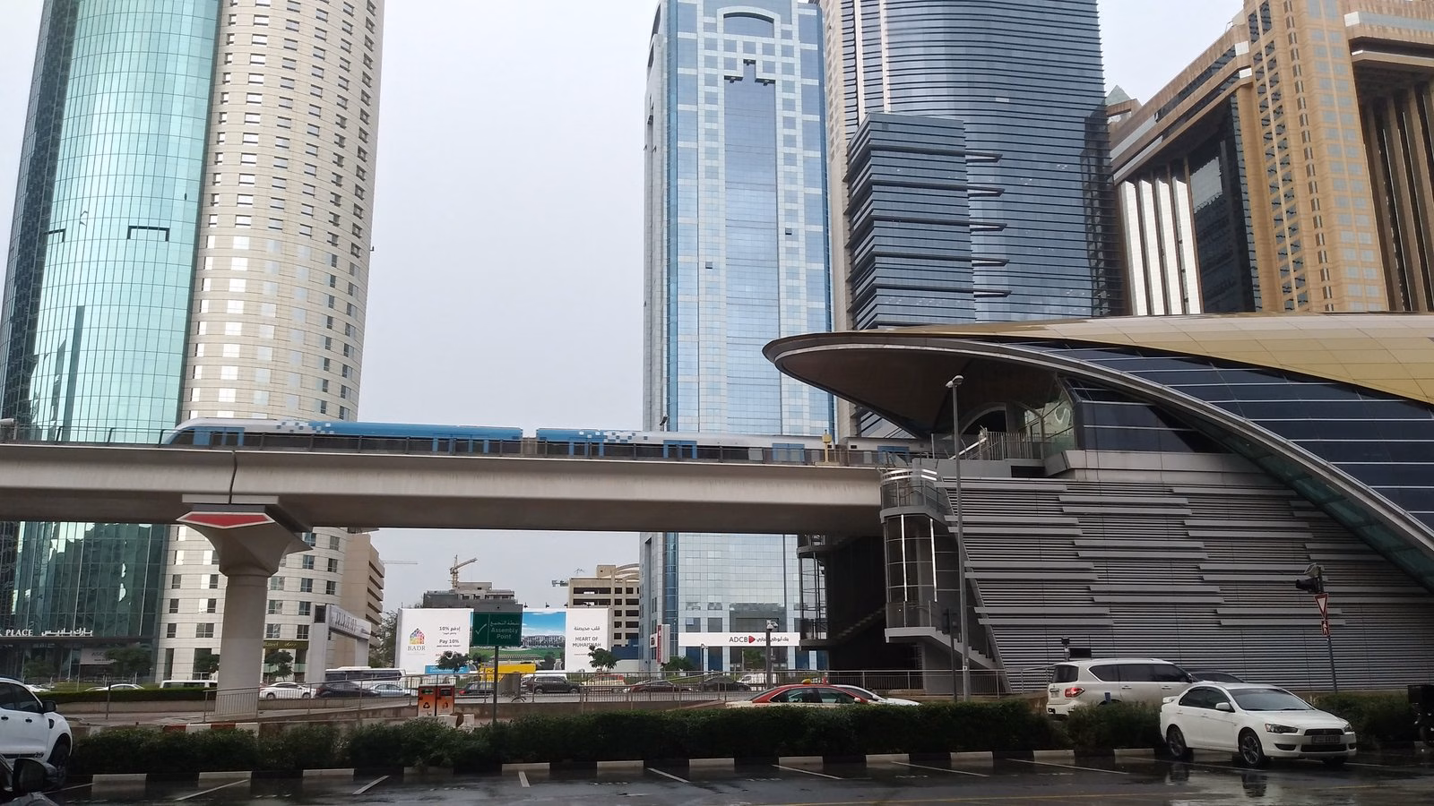 Dubai Metro Red Line viaduct and World Trade Centre Metro Station beside Sheikh Zayed Road, an alternative to driving through the new junction