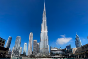 Burj Khalifa above a still Burj Lake in Downtown Dubai while the Dubai Fountain was suspended for the mourning period