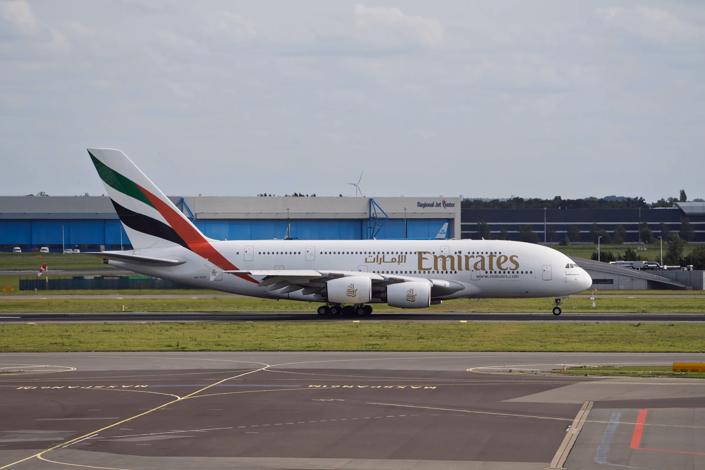 Emirates Airbus A380 taxiing as carriers adjust Dubai schedules amid DXB delays and cancellations