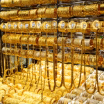 Rows of gold bangles and chains in a jeweller's window at the Deira Gold Souk, a first stop for anyone buying gold in Dubai before Diwali
