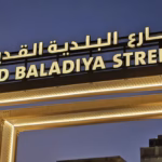 Illuminated bilingual street name sign for Old Baladiya Street in Deira, as Dubai new street signs roll out across 186 areas