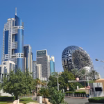 The silver, calligraphy-covered Museum of the Future beside Sheikh Zayed Road towers in Dubai, ahead of the Museum of the Future reopening in 2027